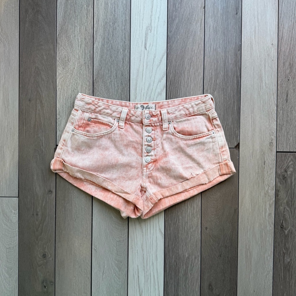 Free People Romeo Rolled Cutoff Denim Shorts in the sunny peach wash